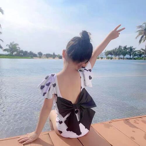 2025 New Korean Girls' Swimwear Children's One-piece Swim Suit with Bowknot Black and White Heart Lotus Sleeve Swimsuit