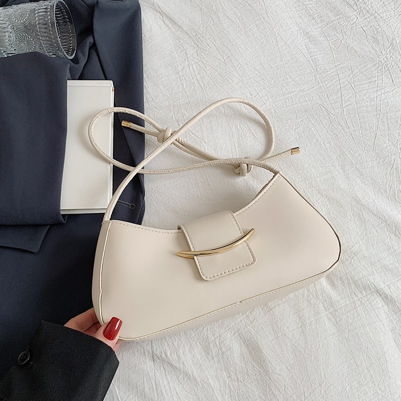 Bolso de axila de un solo hombro de estilo popular de nicho de alta gama para mujer 2025 primavera y verano nuevo bolso bandolera salvaje de moda