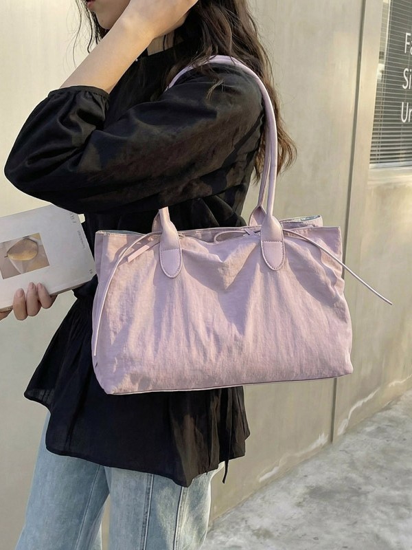 2026 nuevo paquete de moda de tela de alta capacidad, bolso de hombro de alta calidad, bolso de bolsillo pequeño y multifuncional.