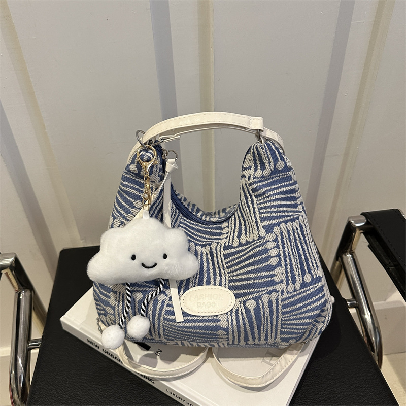 Bolso de lona para mujeres 2024 nuevo otoño bolso universitario de doble propósito mochila de hombro de viaje universal mochila de hombro