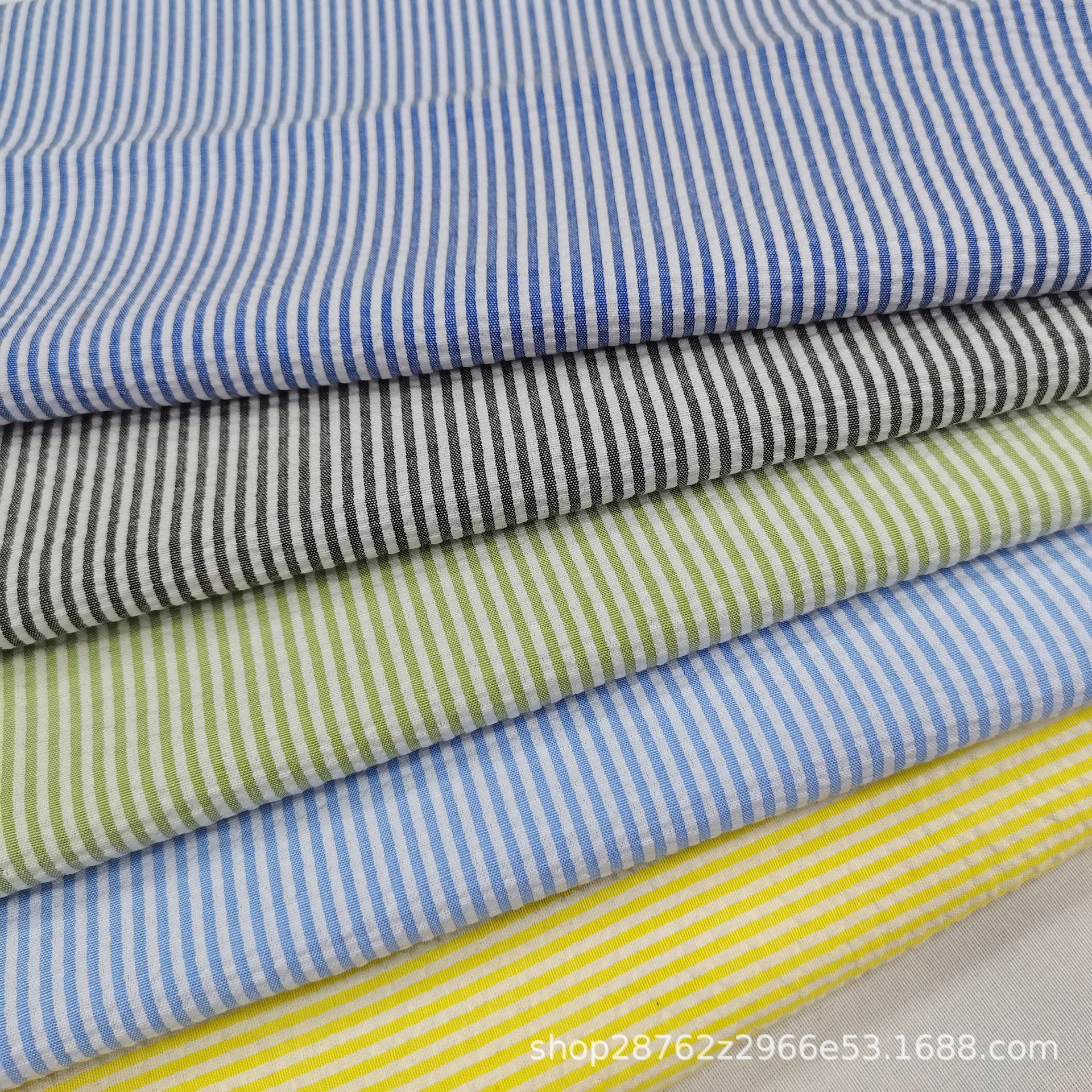 现货21支色织涤棉泡泡条纹布童装衬衫条纹面料跨境爆款提花面料