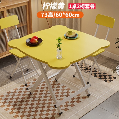 A foldable dining table for home use, suitable for small spaces, minimalist design, with matching chairs, outdoor foldable square table.