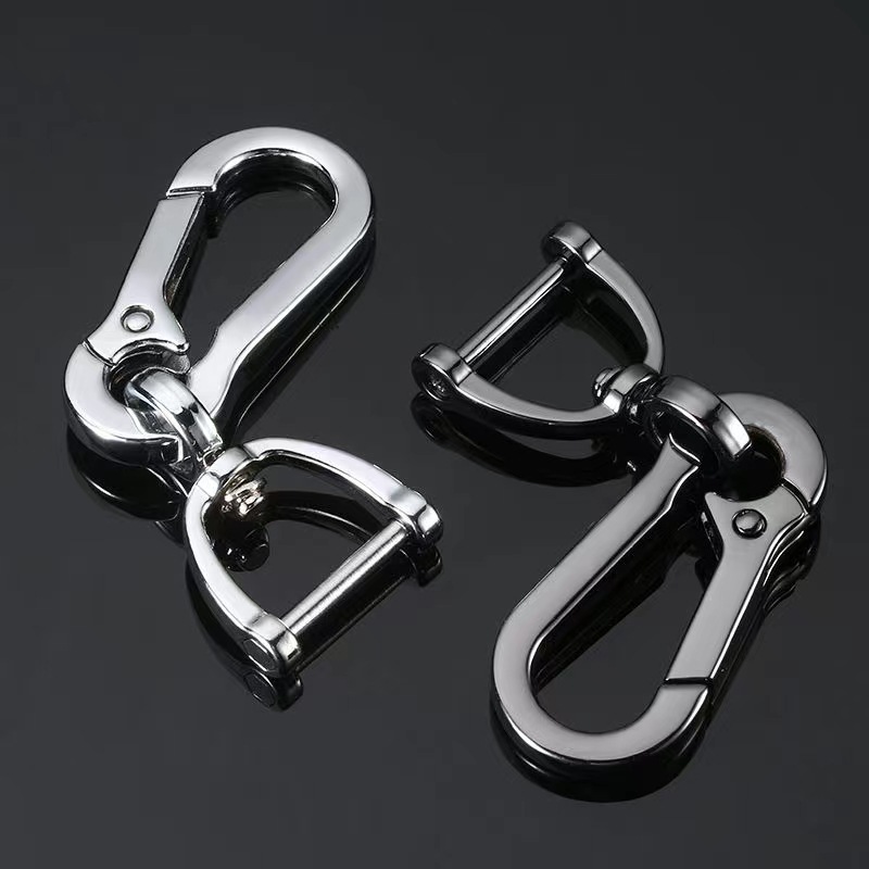 Factory direct sales of high-end alloy car keychains, stirrup buckles, metal keychains, simplified two-piece set, horseshoe buckles.