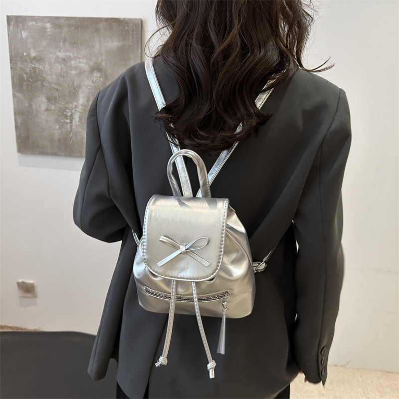 Mochila de nicho coreana para mujer, verano 2024, nueva mochila de moda, bolso de cubo portátil de un solo hombro de todo fósforo