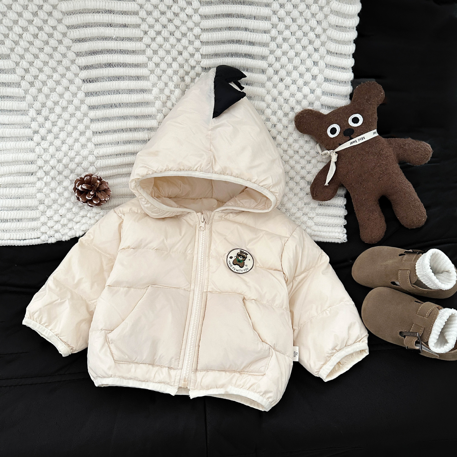 Ropa infantil coreana chaqueta de plumón para niños invierno de aire extranjero chaqueta con capuchón para bebés y bebés con capuchón blanco para calentar aire extranjero