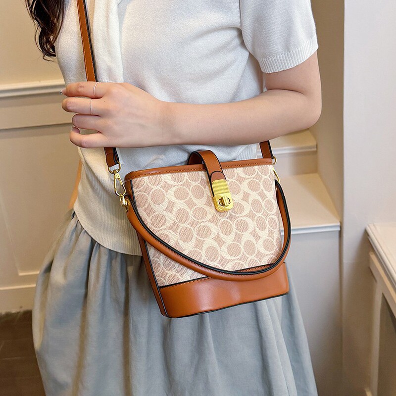Cross-border light luxury printed bucket bag, vintage commuter handbag, versatile high-end niche monogram shoulder and crossbody bag Cross-border light luxury printed bucket bag, vintage commuter handbag, versatile high-end niche monogram shoulder and crossbody bag
