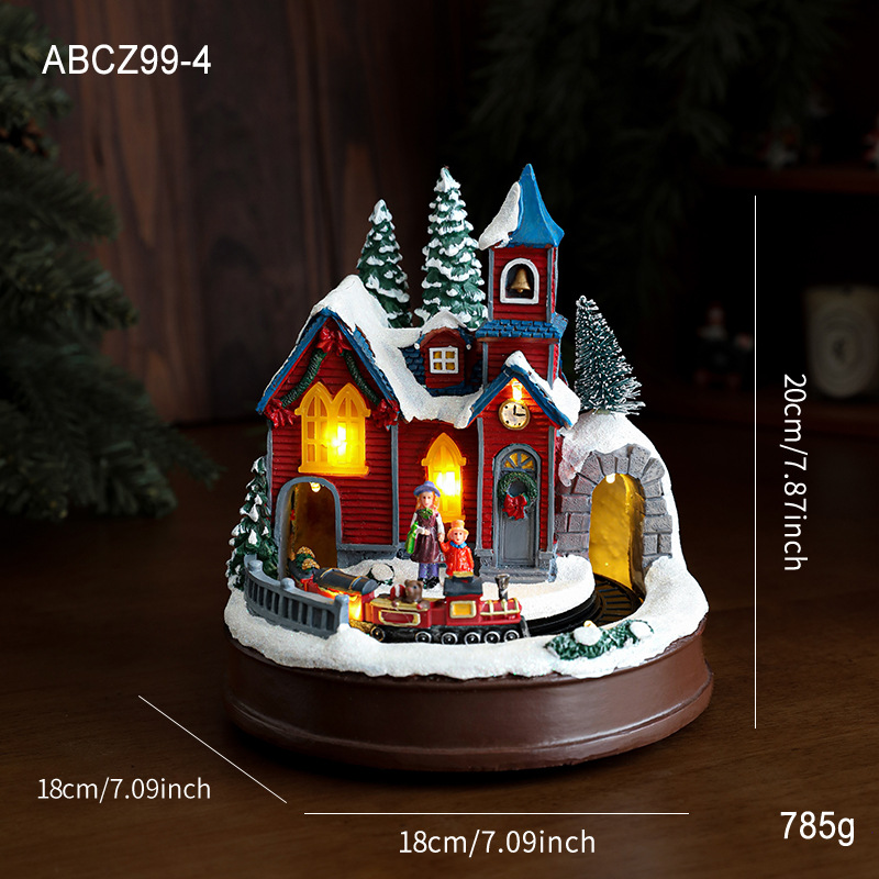 Casa de Navidad de color de resina puede girar el tren luminoso de luz de color caja de música decoración de escritorio de Navidad