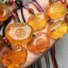 Amber children's organic carved pendant made from antique material wax agate, wholesale