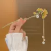 Golden Chinese hairpin with tassels