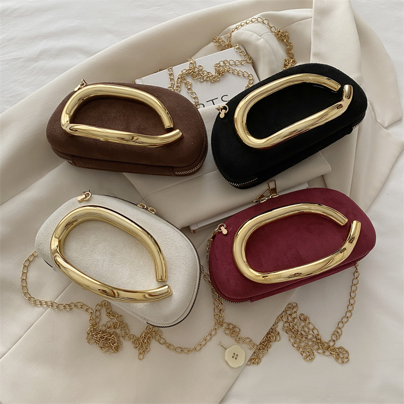 2025 nuevo bolso de moda de mujer caja redonda mano agarrada mini bolsa de metal retro cadena de hombro bolso de hombro