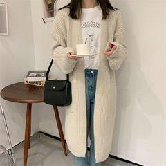 厚いニットのカーディガンの女性の中で長いタイプの韓国版の新型の太い毛糸の外で怠惰な風の純色のゆったりしているセーターのコートを掛けます。