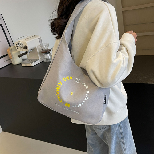 Ins style letter printed canvas armpit bag large capacity spring and summer Ruiying shoulder women's bag middle school student backpack
