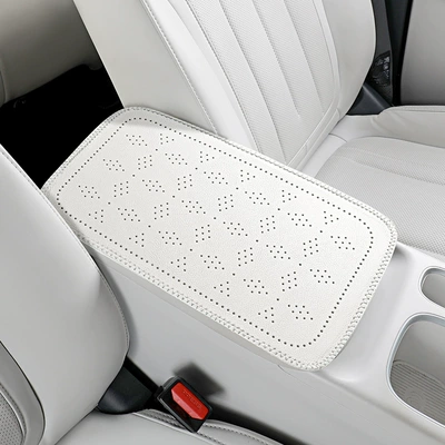 Car armrest box pad with four-leaf clover pattern, perforated leather armrest box protective cover, car central armrest heightening pad