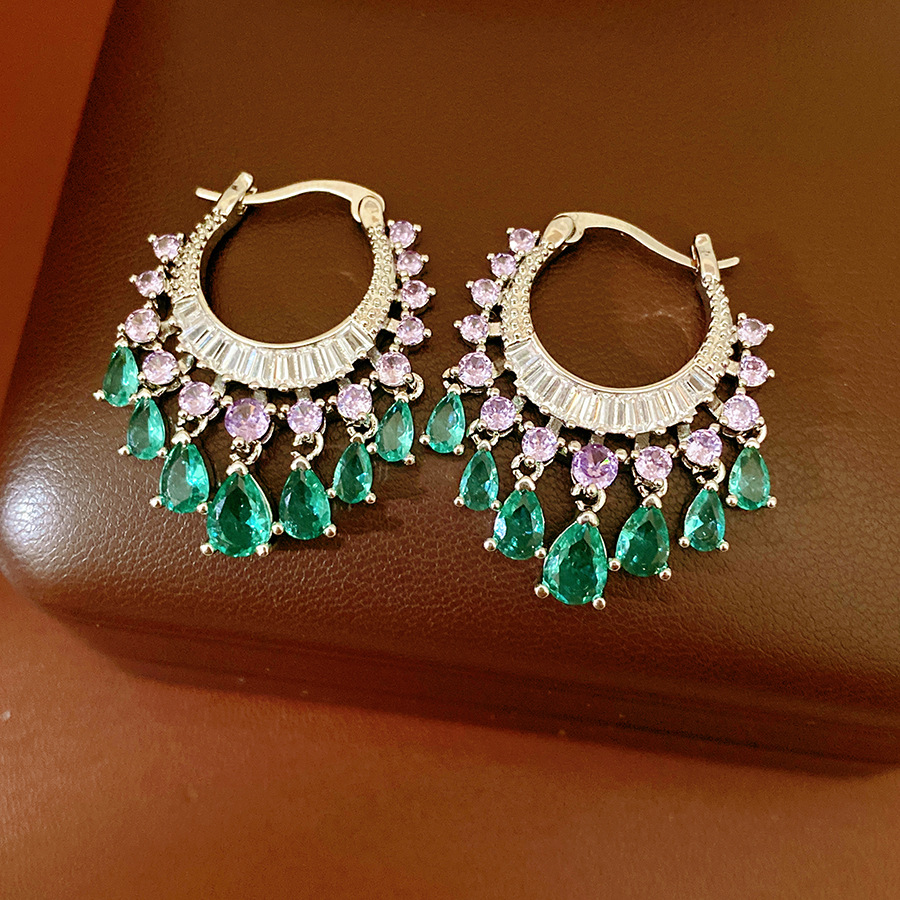 Oreja abrochada - plateada - morada - verde