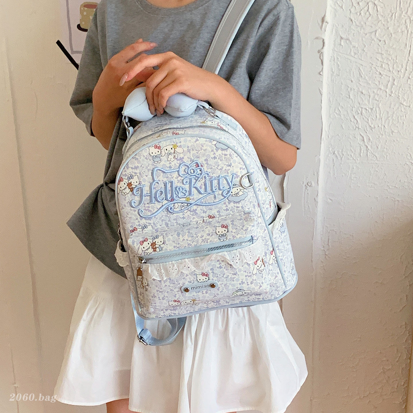 Flores de viaje femenina 2026 clase caricatura lindo nuevo tipo de mochila gato arco mochila de viaje