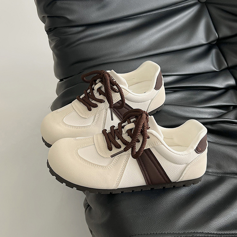 Casual retro Commuter 2025 nuevo estilo primavera y otoño ligero fondo delgado deportes todo fósforo punta redonda fondo plano puff zapatos de entrenamiento alemán para mujer