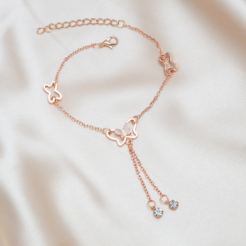 Korean style elegant hollow butterfly diamond-embedded girl tassel anklet female Net red Mori style TikTok rose gold anklet Korean style elegant hollow butterfly diamond-embedded girl tassel anklet female Net red Mori style TikTok rose gold anklet