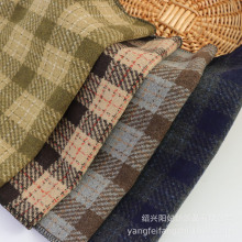 厂家批发 粗纺色织呢绒毛呢格子布料 秋冬服帽磨毛开线小格子面料