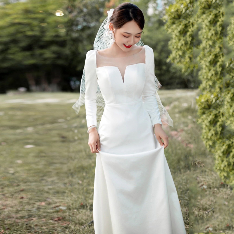 Vestido de boda ligero francés de nuevo estilo de novia de manga larga temperamento sencillo viaje de moda para salir vestido de satén de bienvenida