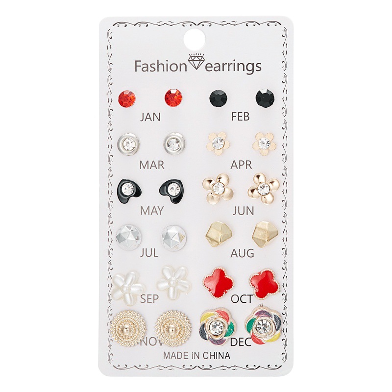 Set de aretes florales con perla y diamantes