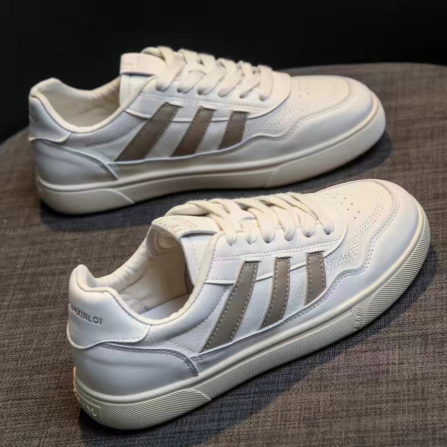 Zapatos de mujer de cuero zapatos blancos mujeres 2025 primavera nuevo estilo rayas planas todo fósforo deportes y zapatos de tablero casual