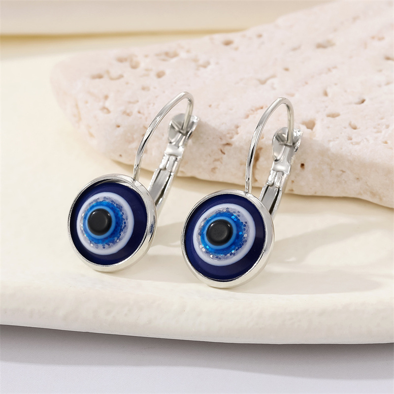 Retro Glitter Blue Eye Bronze Metal Edging Devil's Eye Earrings display picture 3