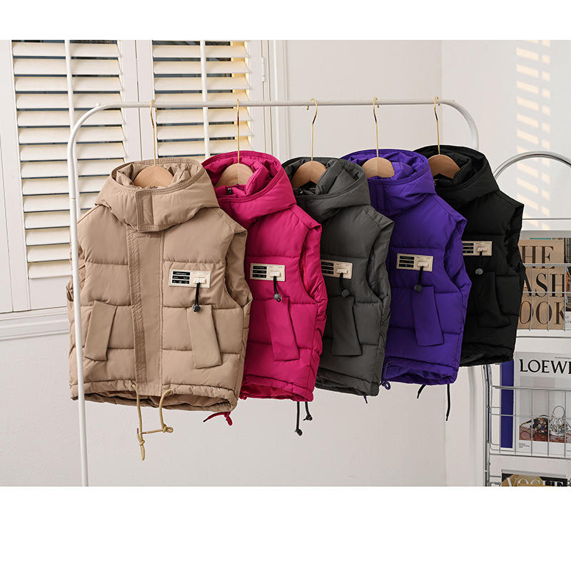 Chaleco de algodón infantil primavera / otoño 2026 nuevo otoño / invierno niños pequeños y medianos niñas chaleco de algodón plumón hombro vestido exterior