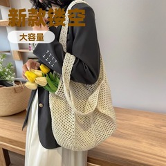 新しい夏の人気の女性用織バッグ、手持ちの織バッグ、ファッショナブルでスタイリッシュなショルダーメッシュバッグ、海辺の旅行用ストローバッグ