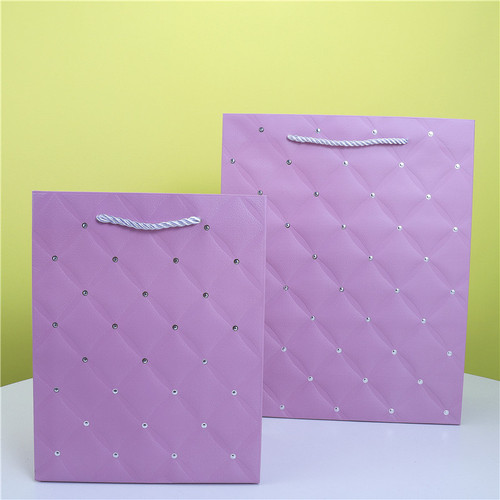 Gold foil embossed white card gift bag single color round dot gold foil hand-held paper bag foreign trade packaging paper bag