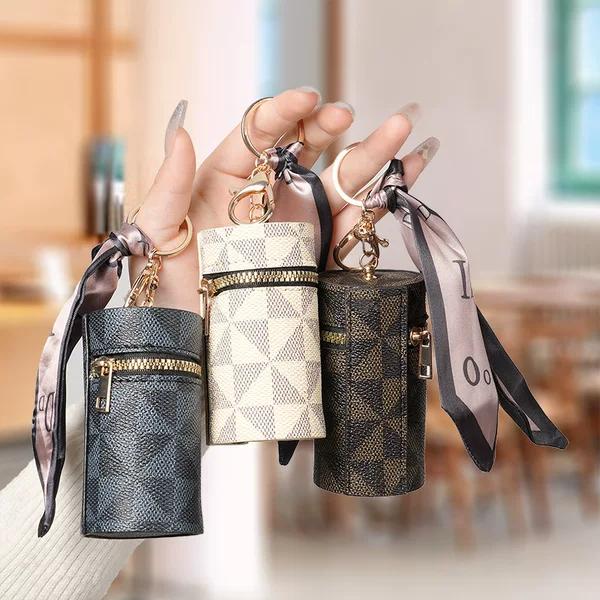 European and American presbyter coin purse 2024 new compact bag pendant earphone bag mouth red envelope mini keychain bag