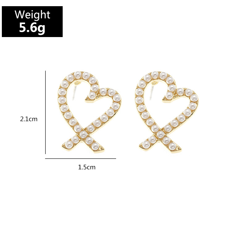 Fashion Heart-shape Pearl Letter Earrings display picture 39