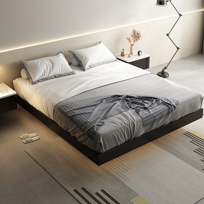 Bedroom with a serene, minimalist design featuring a luxurious yet understated look—this modern, sleek floating bed frame includes an induction light and is crafted from solid wood, perfect for a cozy double bed.