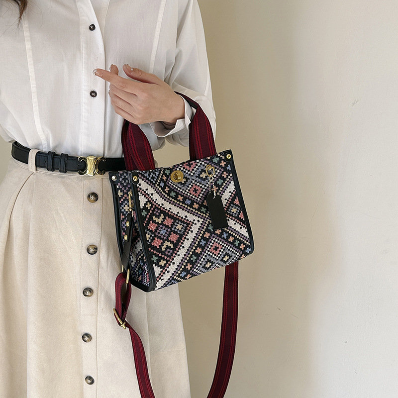 Gran capacidad lona Plaid Portátil Bolsa femenina 2024 transfronteriza primavera nuevo trabajo viajero hombro bolsa de mensajero