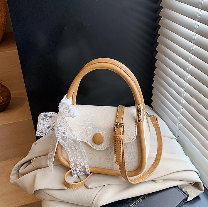 Bolso cuadrado pequeño estilo explosivo único exterior para mujer 2025 nuevo bolso de mensajero simple de color en contraste cuero de cera de aceite bolso de hombro todo fósforo de nicho