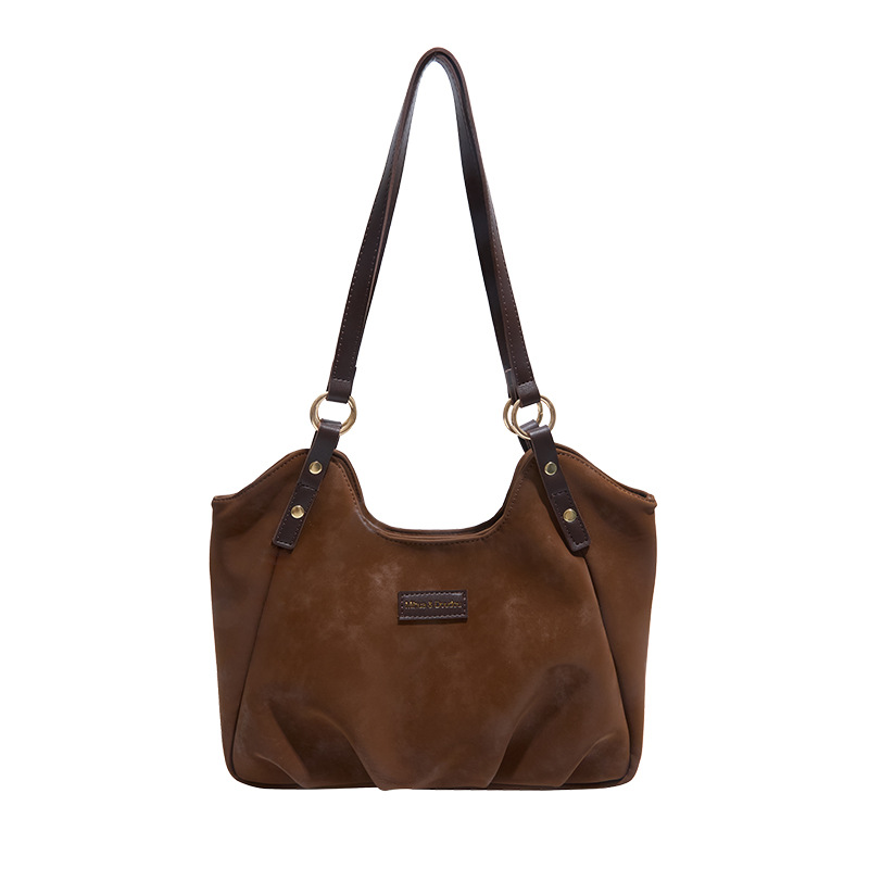 Bolsa de mano de peluche retro de gamuza para mujeres 2025 nueva moda versátil bolso de viaje tote bolso de hombro casual braza