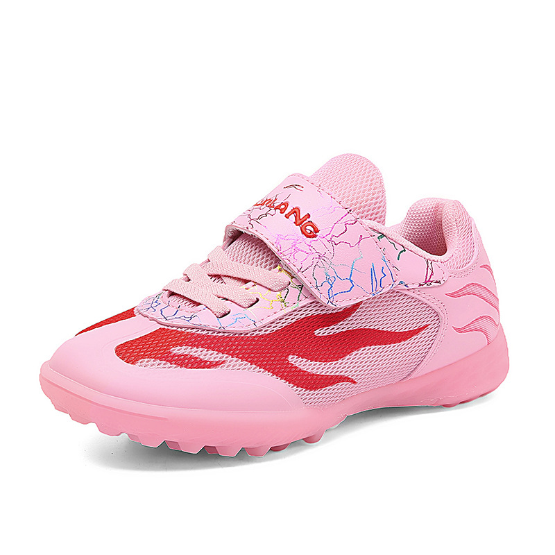 Nuevo transfronterizo niños y niñas transpirables cómodos deportes ociosos zapatos de fútbol clavos de hierba competencia de niños estudiantes fabricantes