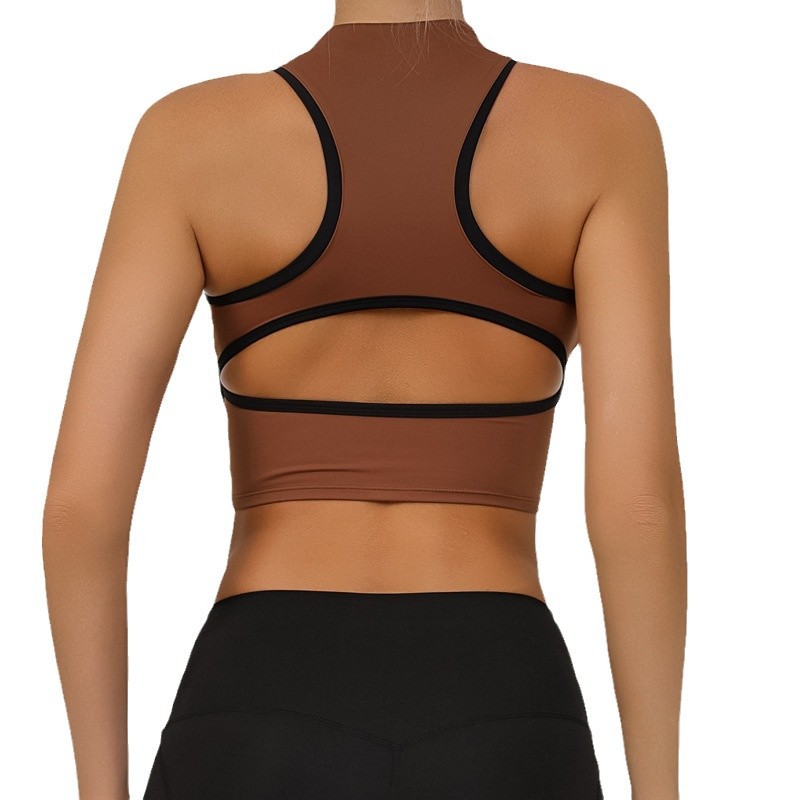 Chaleco de yoga deportivo europeo y americano personalizado para mujer con cremallera envuelta en el pecho a prueba de golpes y contraste de color fitness de secado rápido