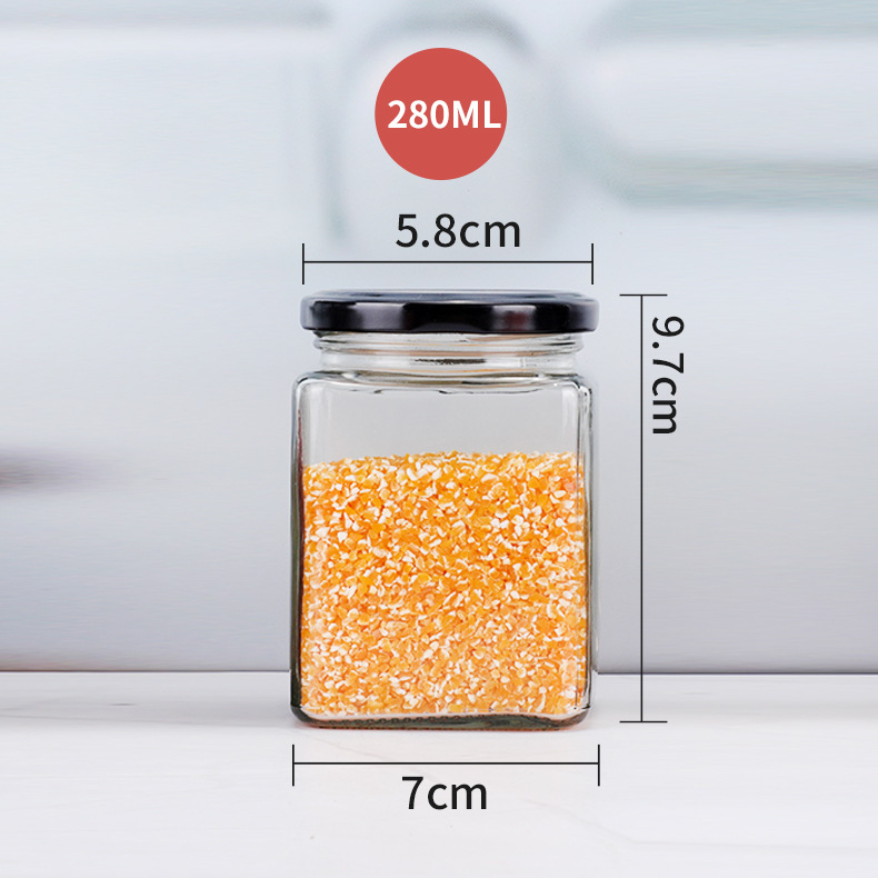 Suministro de botella de vidrio de cuatro bordes sellada transparente cuadrado multi-grano botella de almacenamiento puede botella de miel sub-botella al por mayor