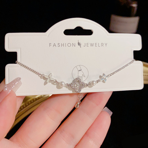Internet celebrity style, fashionable and elegant, delicate micro-inlaid hollowed-out four-leaf clover bracelet for women, sweet and luxurious all-match bracelet