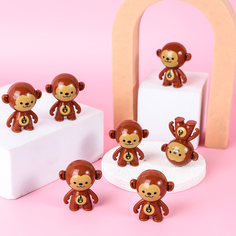 Vaso de dibujos animados giratoria truco mini mono lindo 45mm huevo torcido juguete para niños regalo puesto al por mayor