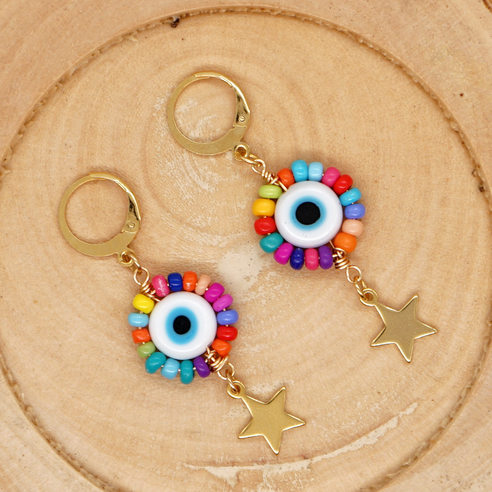 Fashion Pentagram Eye Mixed Materials Glass Earrings display picture 4