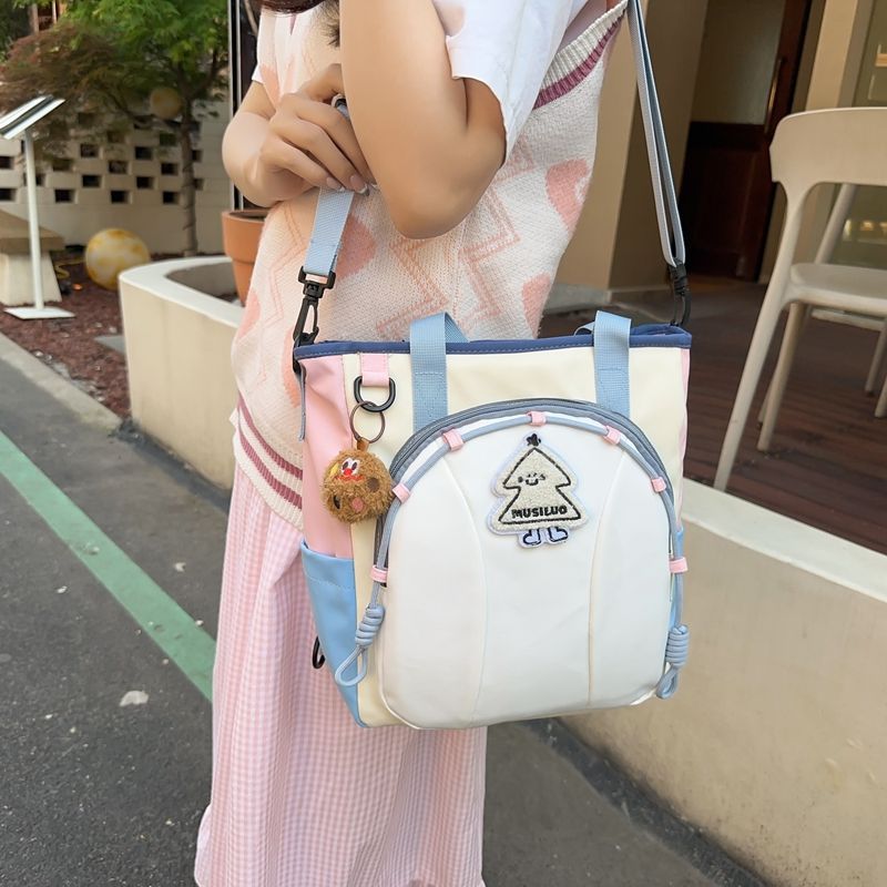 森系女ins风学院初高中生上课斜跨双肩手提书包多功能立体大容量