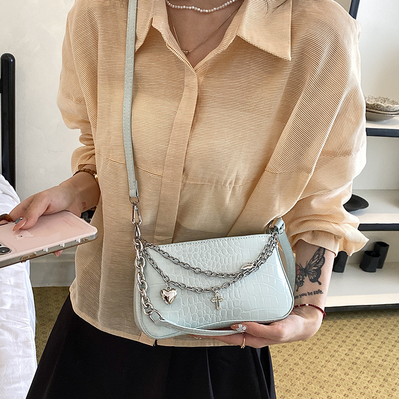 Nicho de diseño de cadena de viaje bolso pequeño para mujeres 2026 verano nuevo estilo de alta calidad cocodrilo mochila de hombro