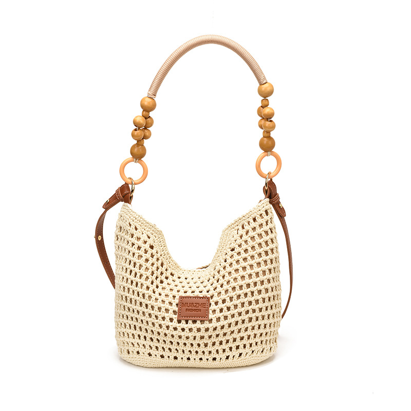 Bolsas de gran capacidad de tejido hueco para mujeres 2026 nuevas bolsas de playa de vacaciones en la playa de viaje nicho brazo Tote image 11