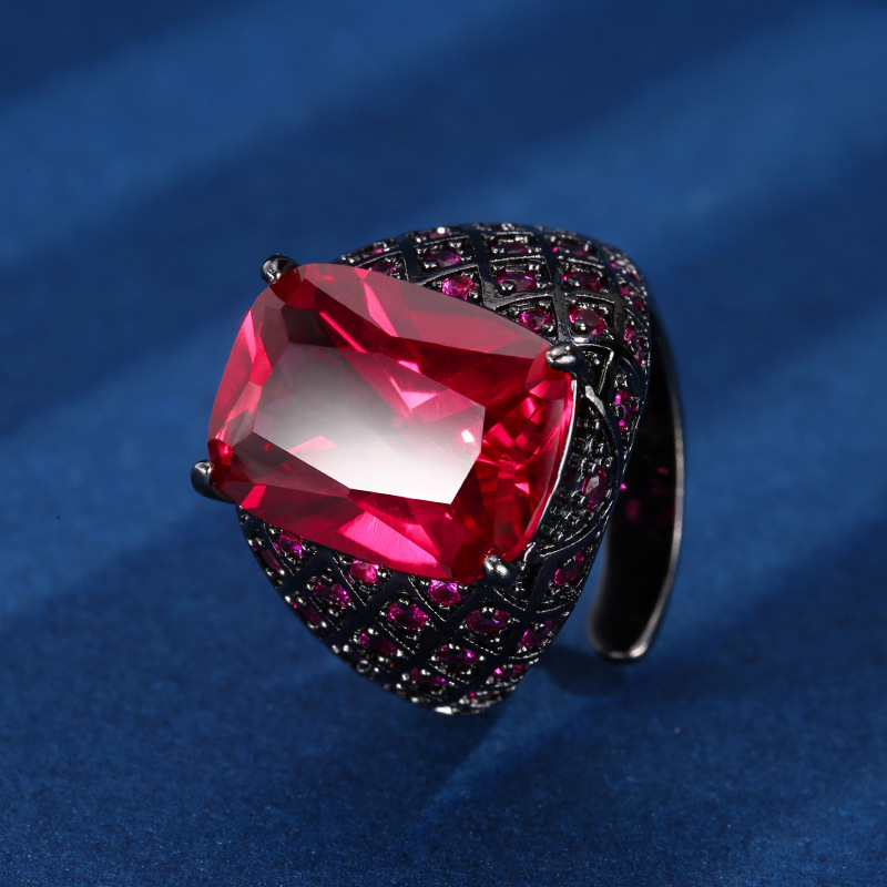 Otoño e invierno nuevo estilo Zhuang Shengsheng joyería fondo de cobre chapado en oro simulación cristal puntiagudo azul anillo retro mujer piedra 12*16