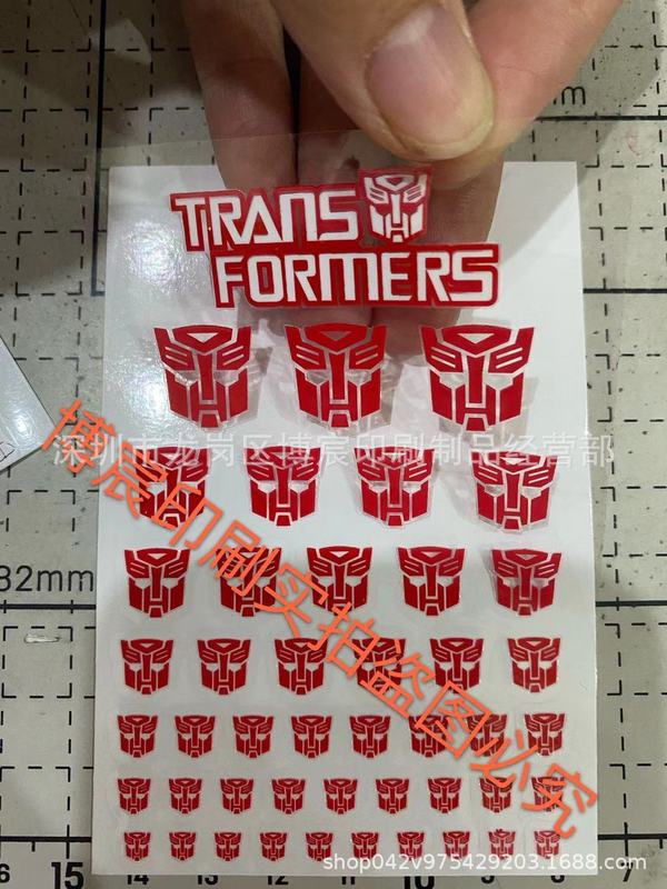 カスタマイズされた既製トランスフォーマーおもちゃロゴステッカーディンセプターキンティアンジュ転写ステッカー UV ティアオフフィルムラベル|undefined