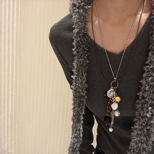 Utopia series metal conch tassels long niche design black pig pearl sweater chain versatile double-layer necklace