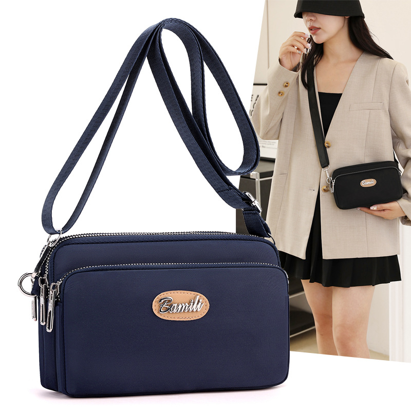 2025 nuevo estilo coreano moda transfronteriza todo fósforo Oxford tela bandolera bolso pequeño ligero casual de hombro para mujer