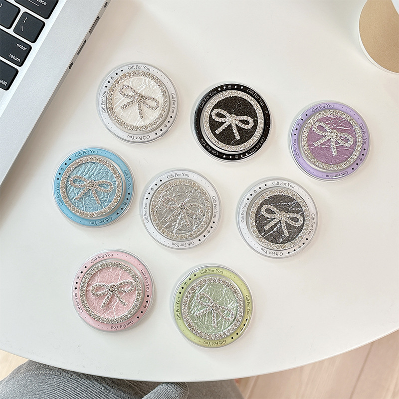 Rhinestone bow round light luxury mobile phone airbag bracket paste magnetic retractable lazy desktop grip bracket