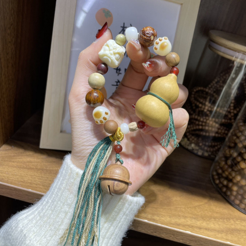 菩提手串は多宝手串星月走環紫檀目を覚ます獅子の象牙の実を持っています。|undefined